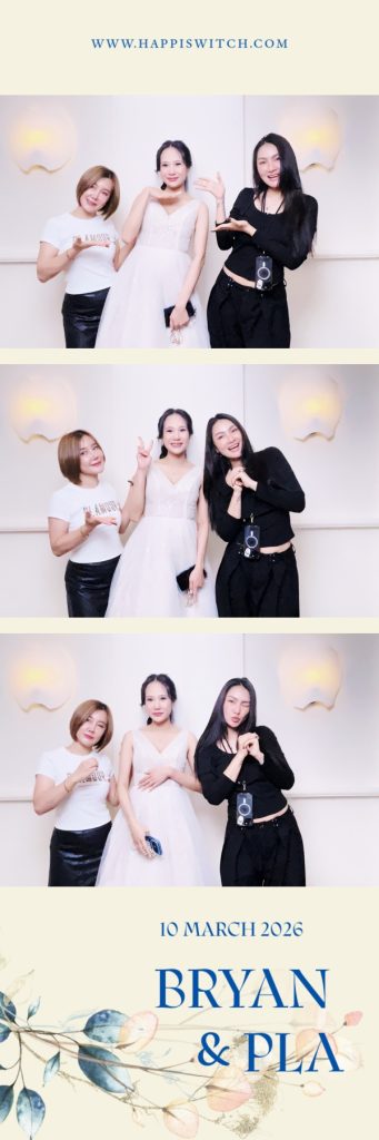 The couple's 2 by 6 wedding photostrip, cream design with their names, Singapore