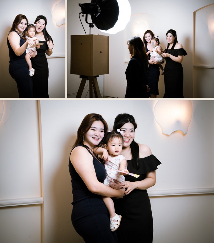 Wedding guests with a toddler at the photobooth, 1-Flowerhill Sentosa