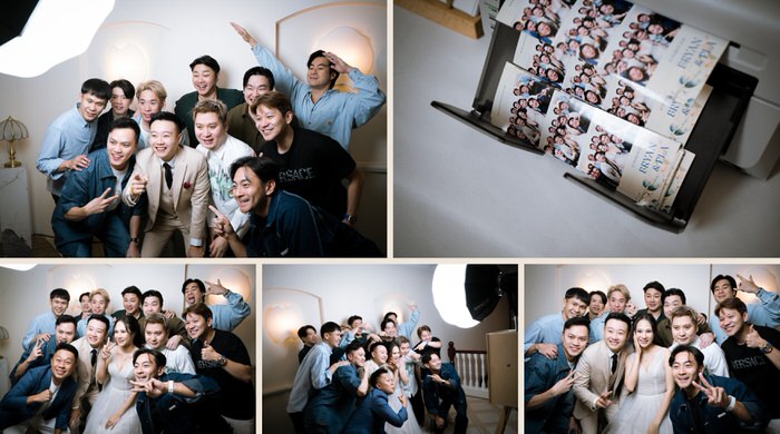 Large group of wedding guests in one photobooth frame, and their photostrips printing